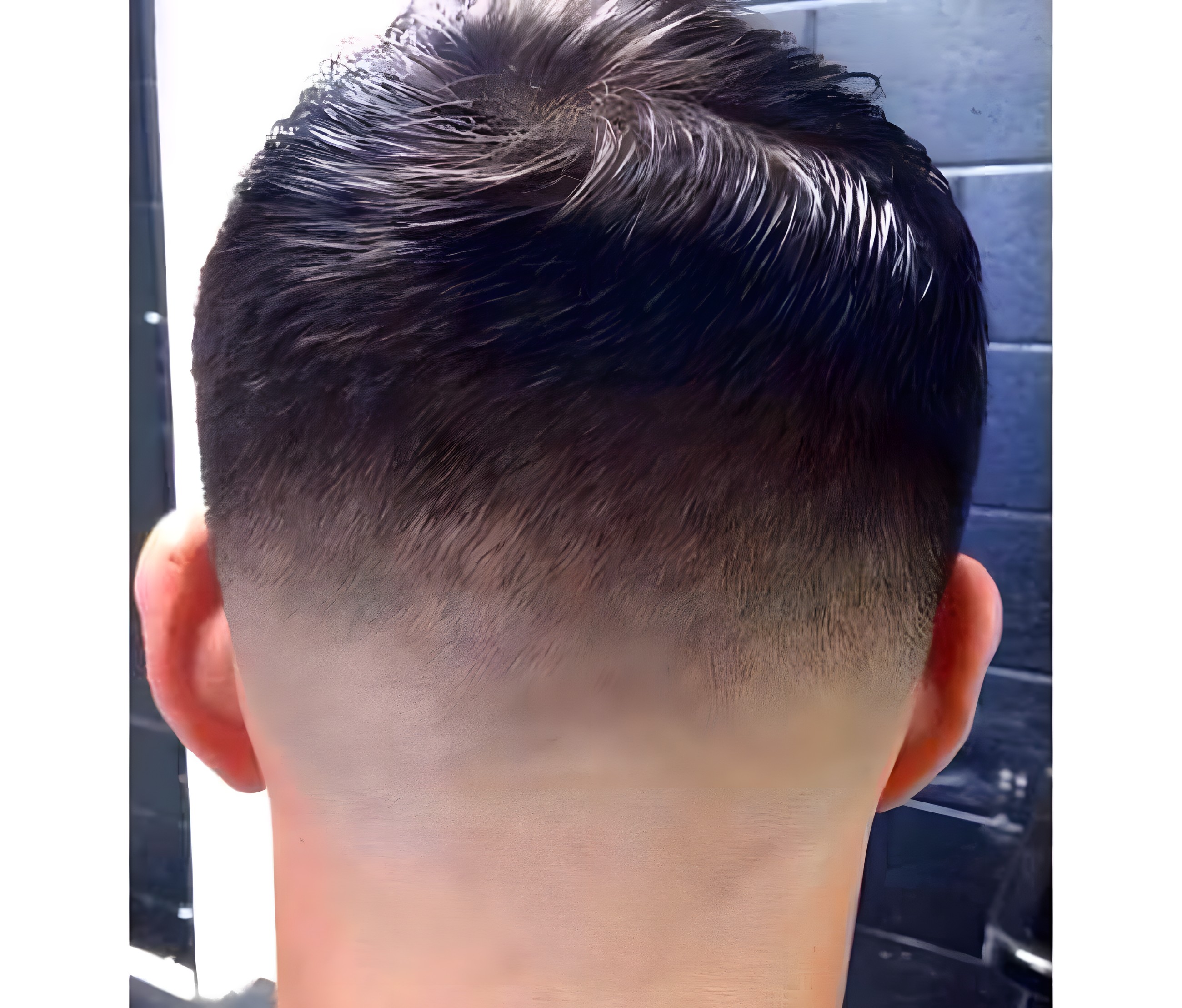Sharp skin fade seen from the back